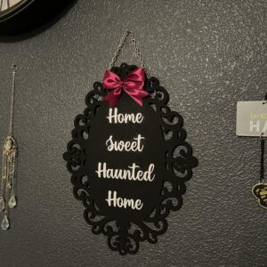 Home Sweet Haunted Home with bow